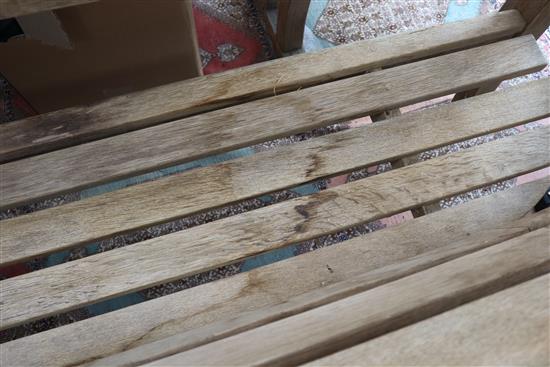 Gaze Burvill. An oak garden table, bench, low bench and pair of chairs Table L.170cm, Bench L.210cm, Low bench L.195cm